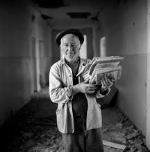 A man salvaged books from classrooms in School No. 1, Beslan, North Ossetia, September 2004